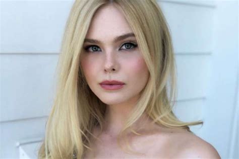 Elle Fanning Dazzles In New Beach Photos As She。